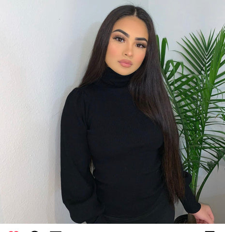 Black turtle neck sweater